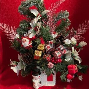 Vintage Snowman Planter Holiday Greenery Arrangement Festive Table Display